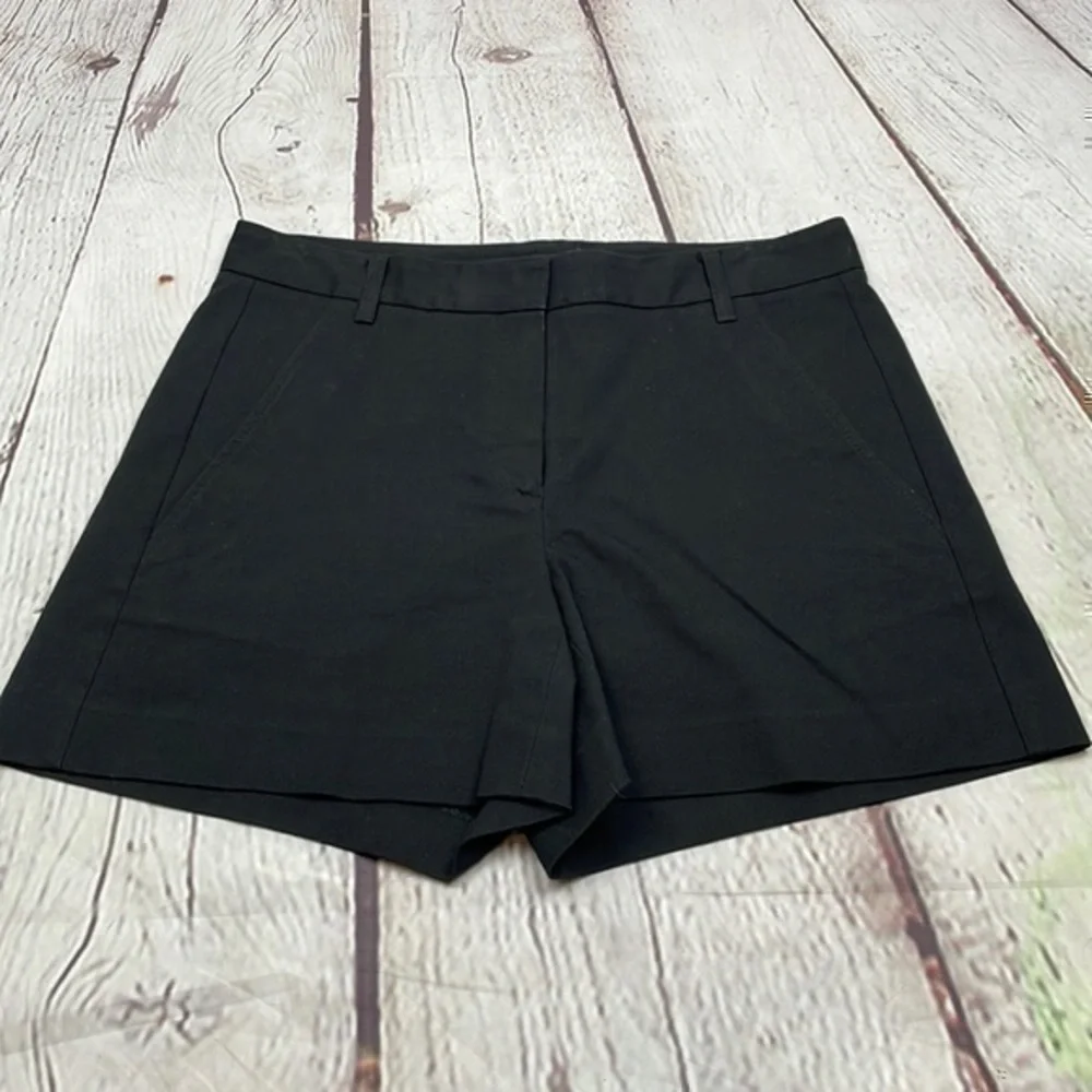 UEC theory black flat front shorts Midrise size 4